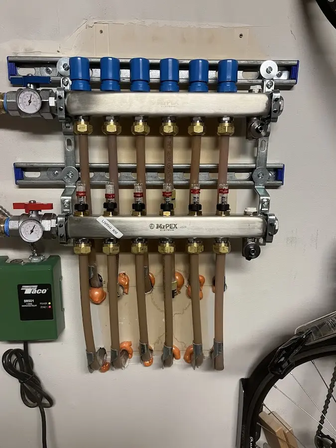 Plumber performing Leak Detection at a residential property in Crystal Lake